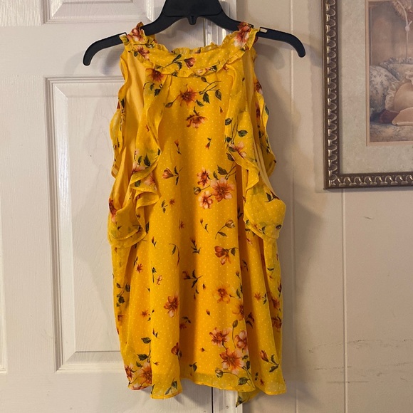 Tops - Halter top with ruffles. Ties at the neck in the back. Yel w/beautiful flowers